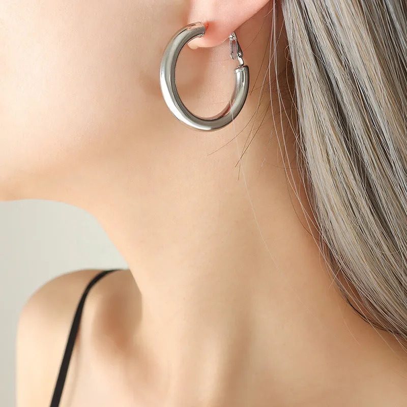 Fashionable Titanium Steel Gold-Plated Hollow Round Tube Earrings