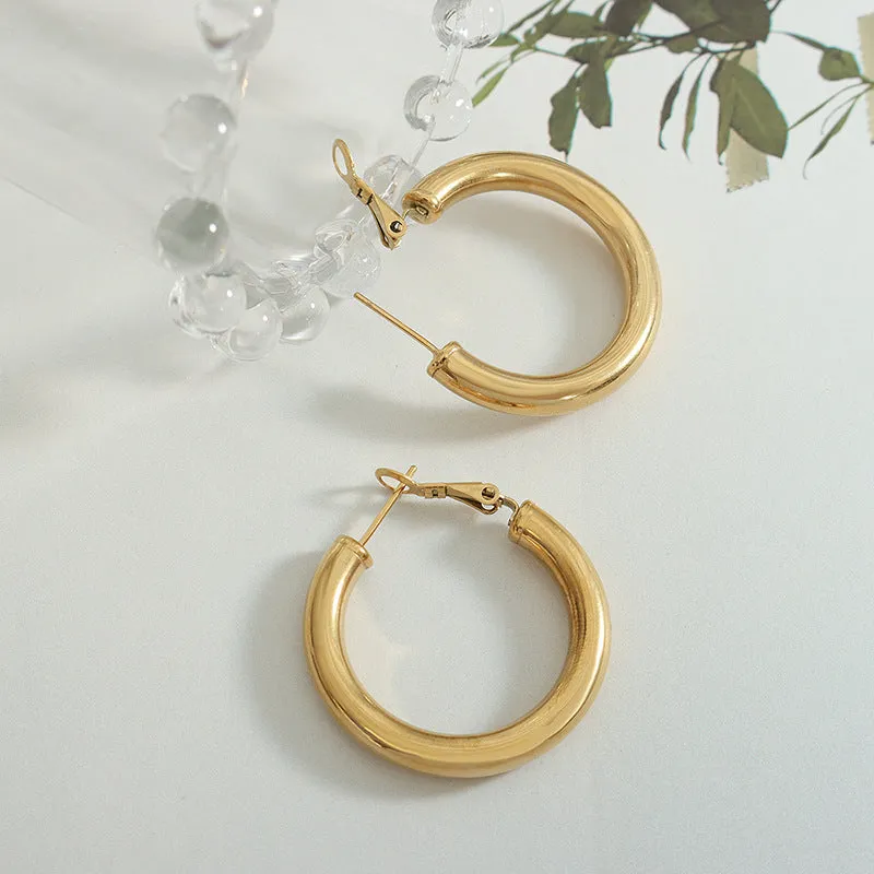 Fashionable Titanium Steel Gold-Plated Hollow Round Tube Earrings