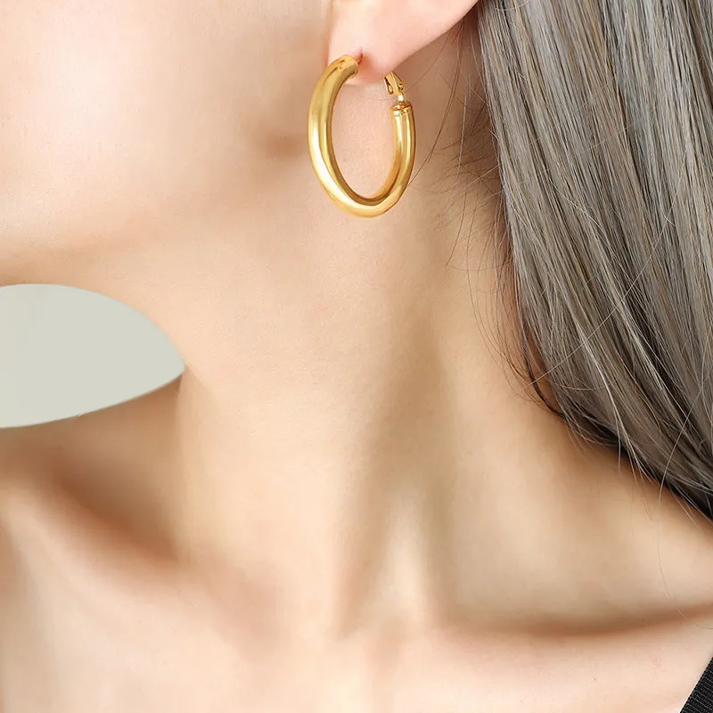 Fashionable Titanium Steel Gold-Plated Hollow Round Tube Earrings