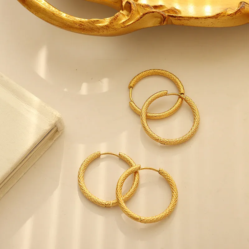 Luxurious Gold-Plated Circular Earrings with a Fashionable Twist